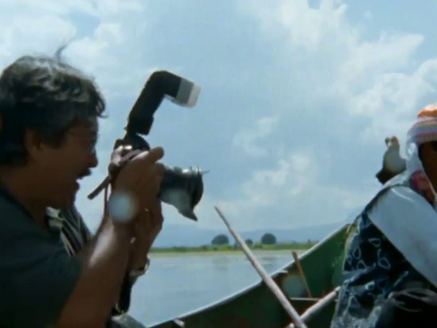 Michael Yamashita shooting from a small boat